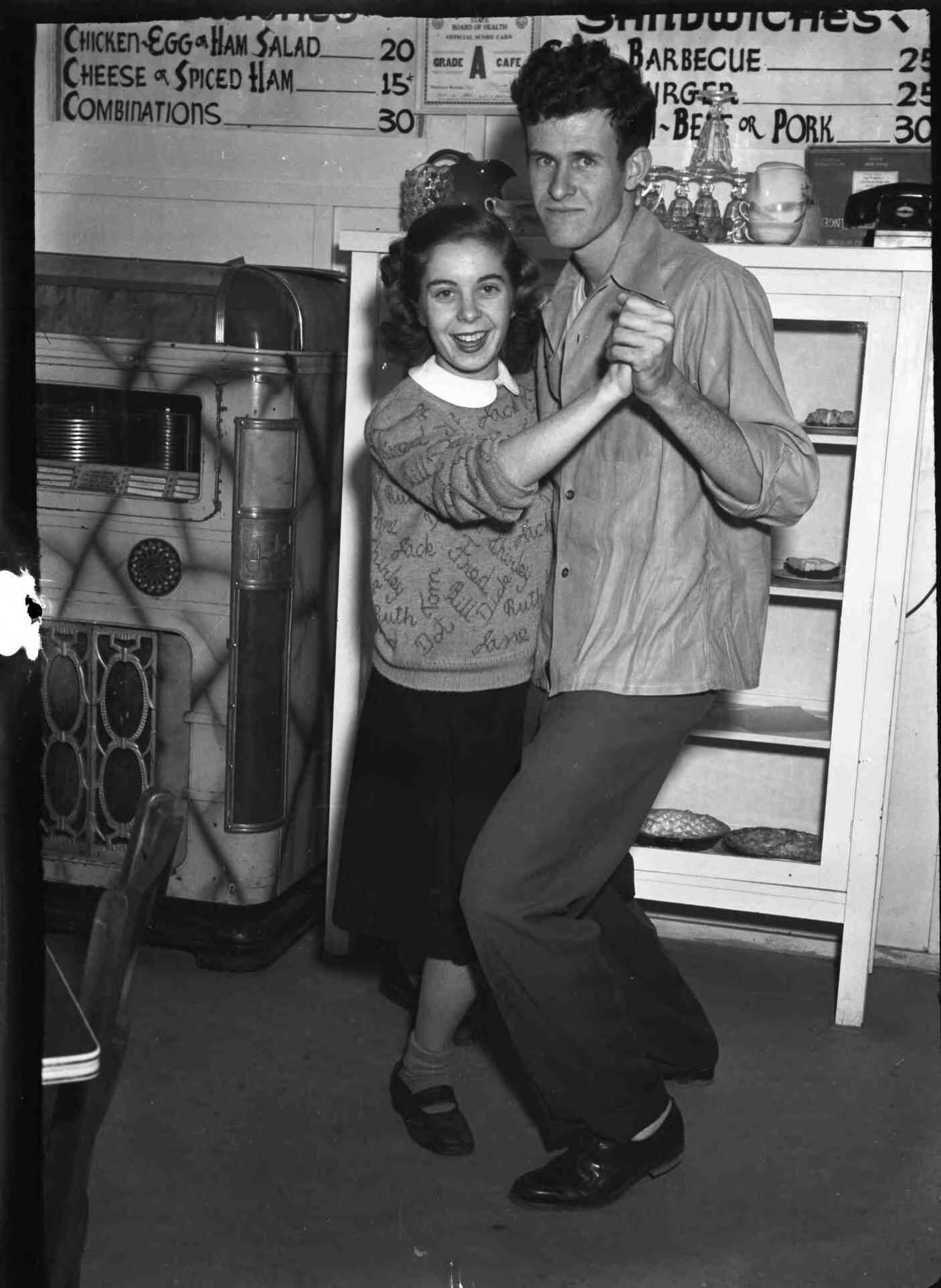 Brevard High School, Lois Ann Orr & Jack Moore dancing in cafeteria, 1947