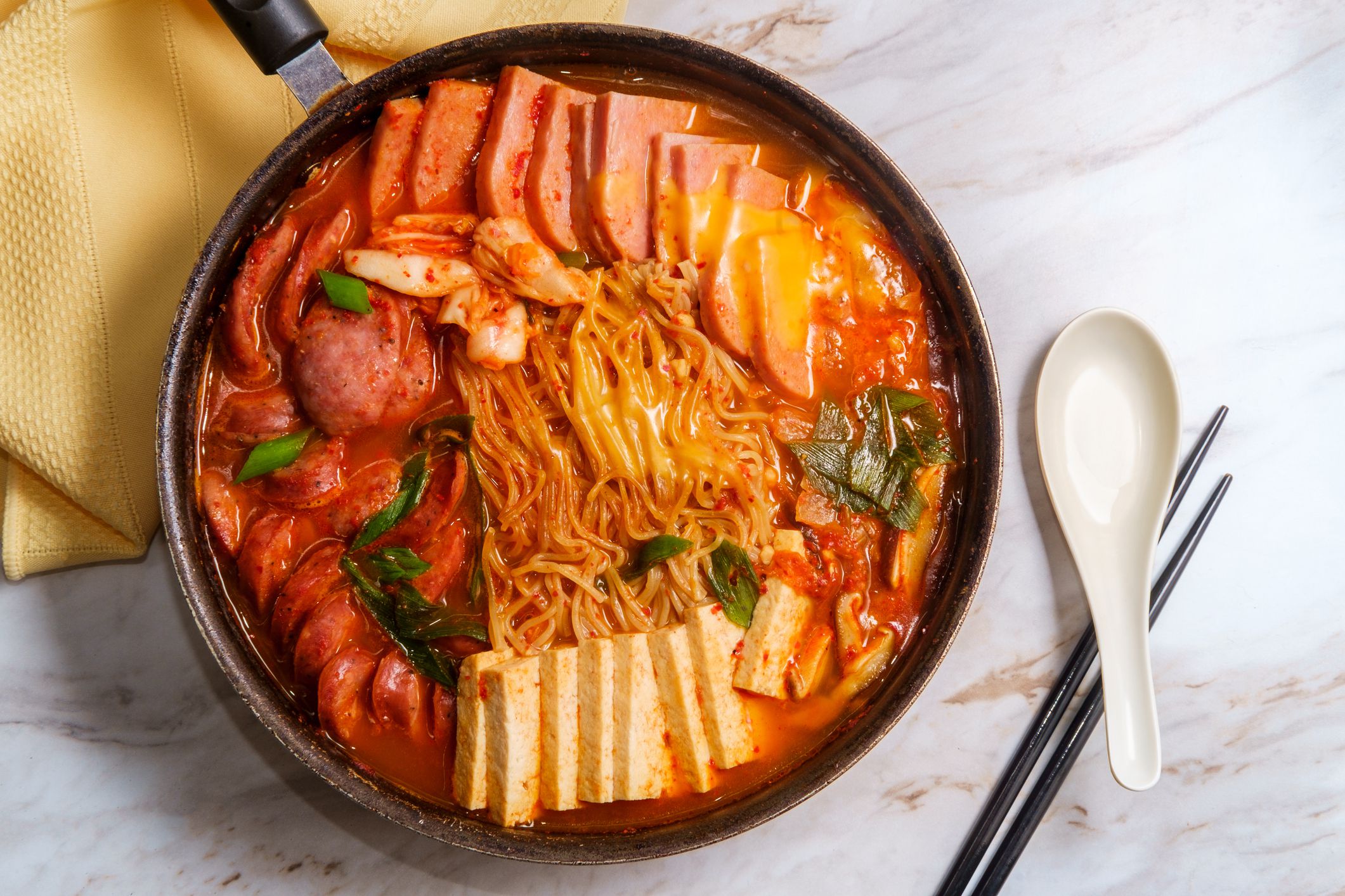Korean comfort food army base stew also known as Budae-jjigae with sausage tofu and canned ham