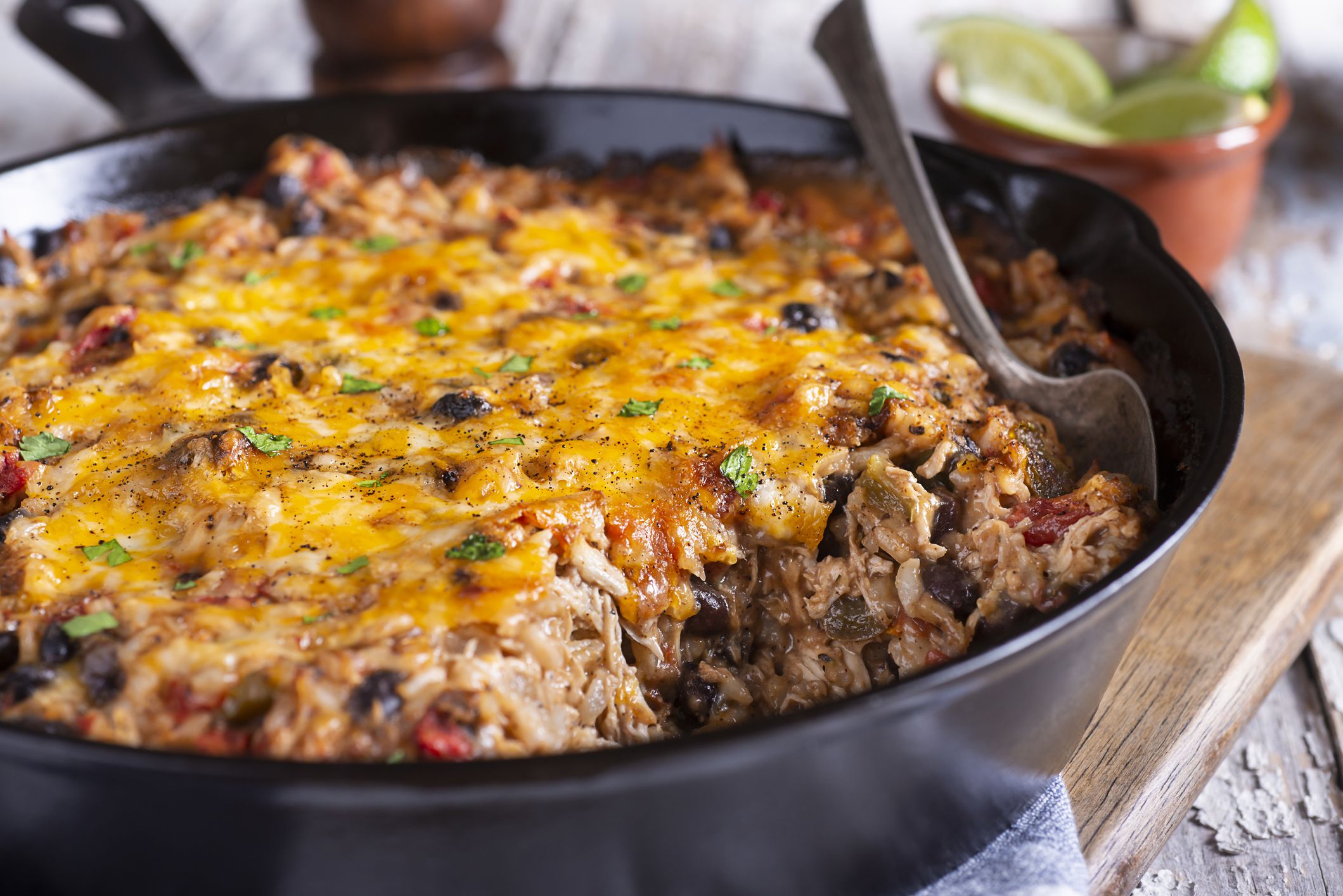 Southwestern Shredded Chicken Skillet with Rice, Black Beans, Tomato and Cheese
