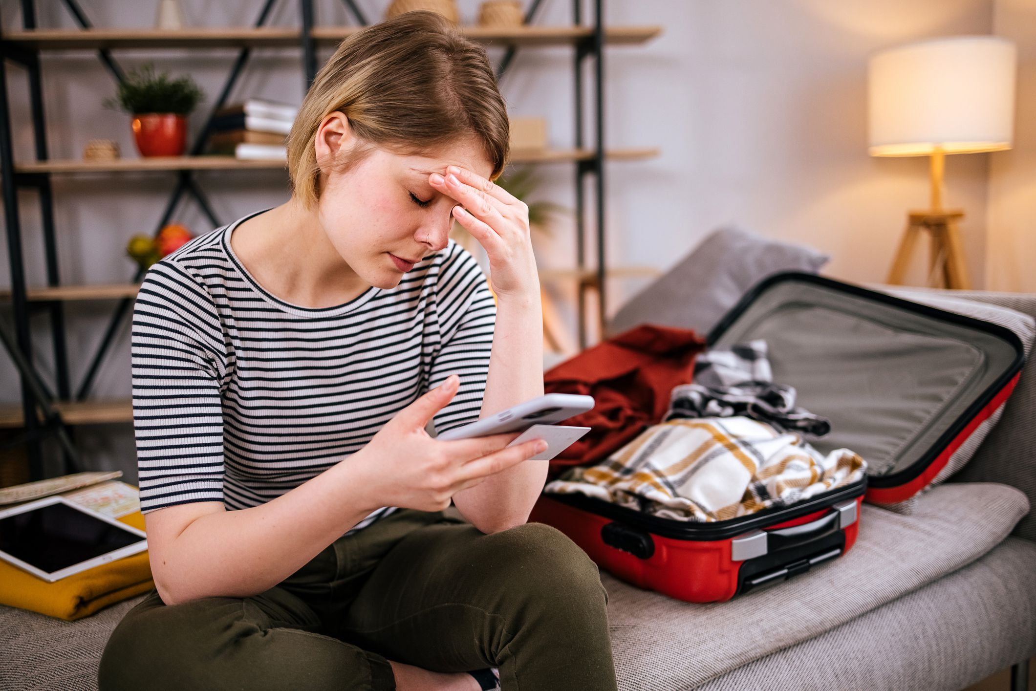 Woman complains of a headache before a trip