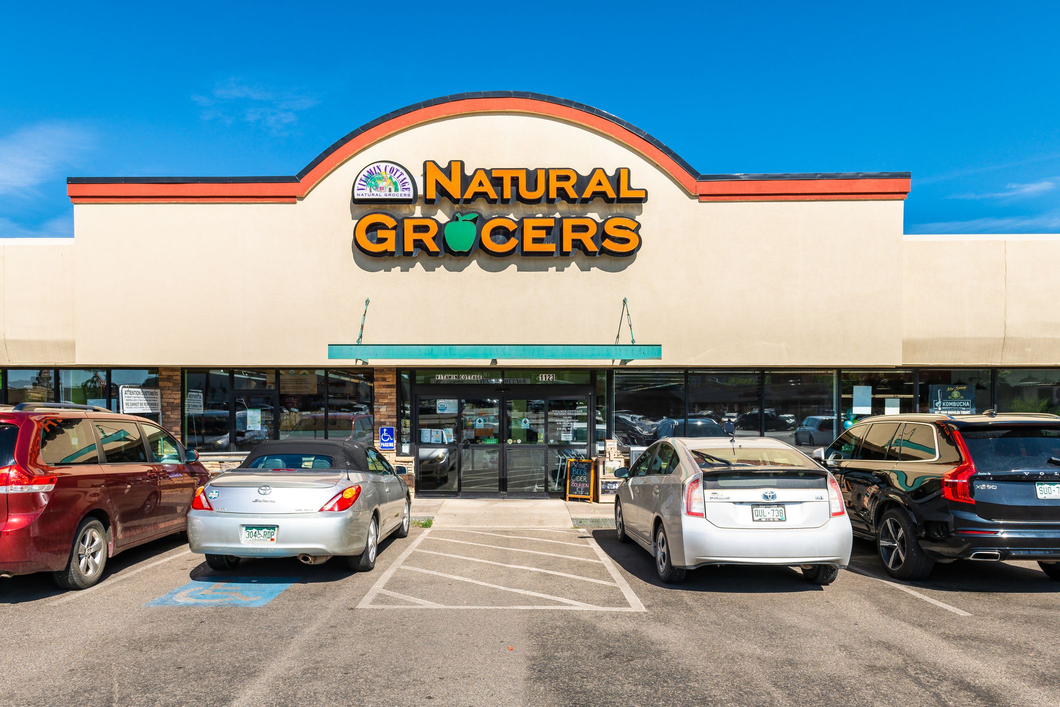 Durango, USA - August 22, 2019: Natural Grocers Vitamins Cottage store sign storefront retail shop selling organic fresh produce, meat and vitamins