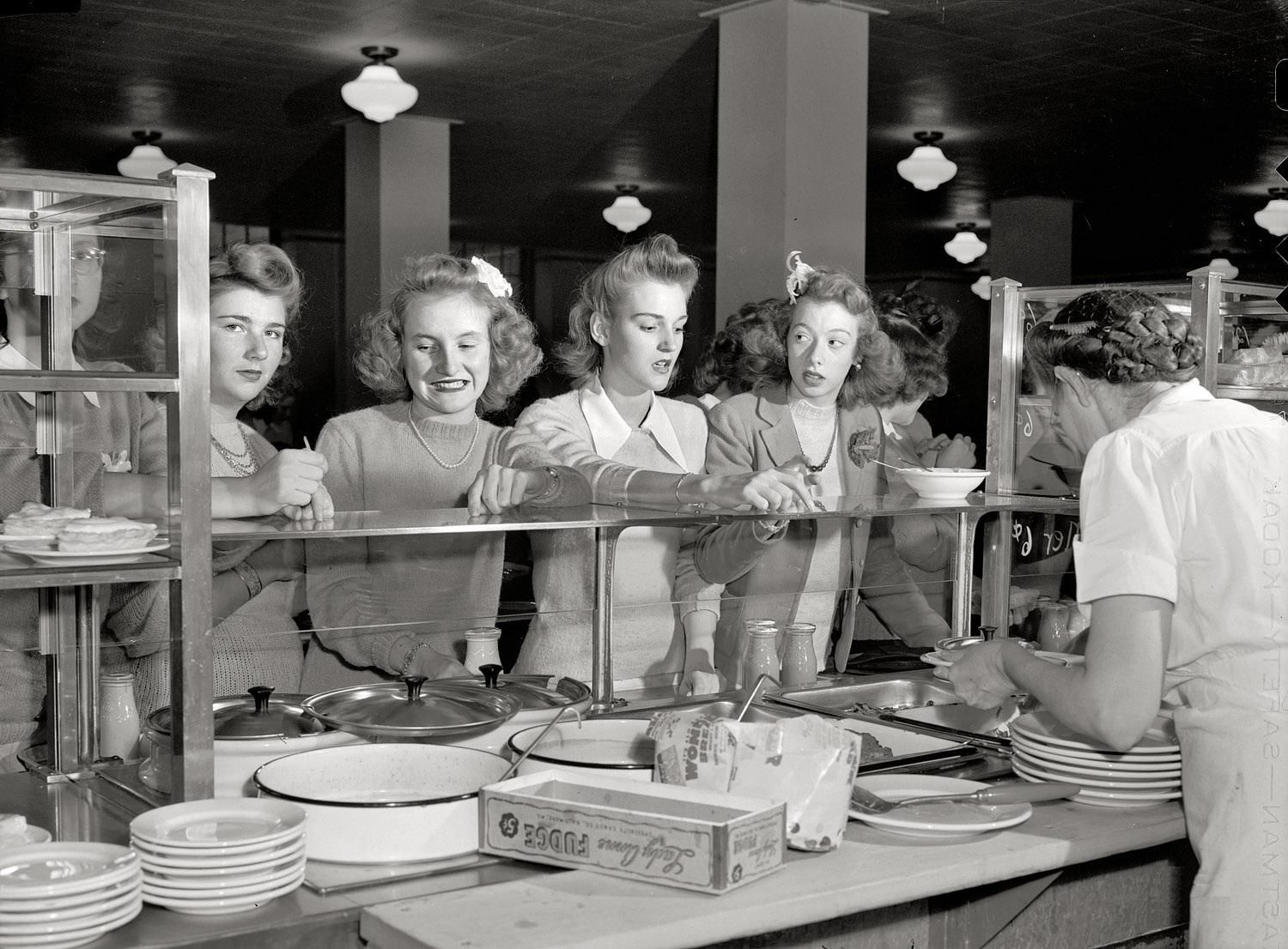 Girls in line in the cafeteria at Woodrow Wilson High School, Washington, D.C., October 1943.