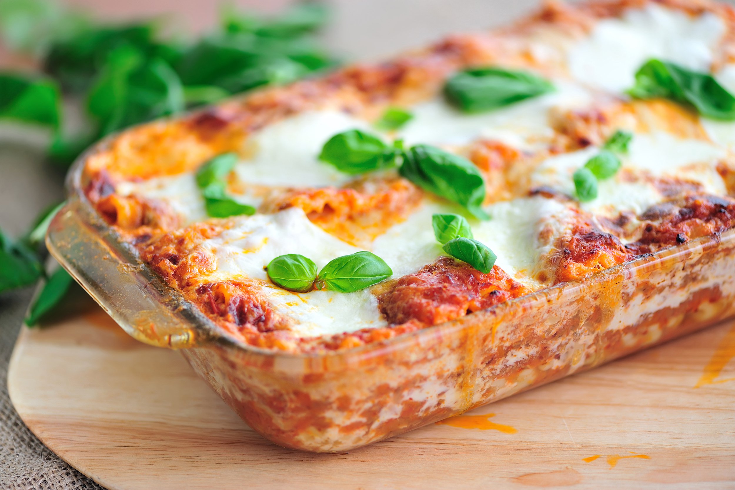 Lasagna in a glass casserole dish
