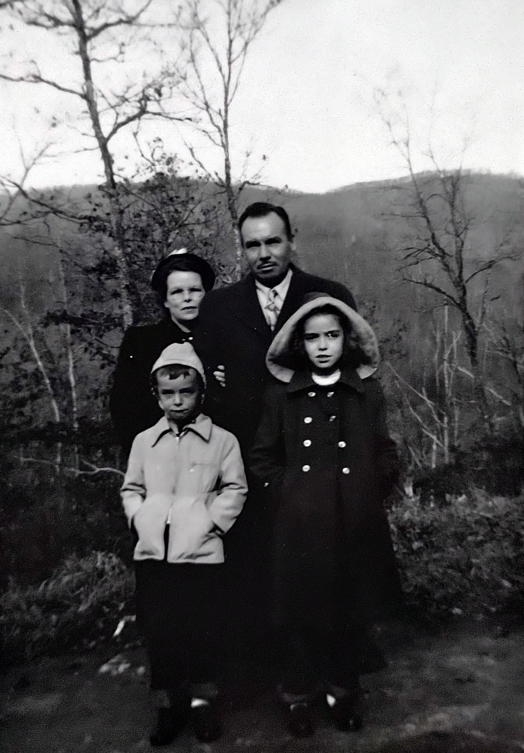 My grandparents, my father, and my aunt on vacation sometime in the mid 1950s