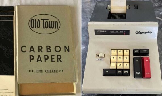 A box labeled "Old Town Carbon Paper," a staple among popular products from the 1960s, sits open on the left, while an old Olympia adding machine&mdash;one of many obsolete 1960s products&mdash;rests on the right with large buttons and a paper roll.