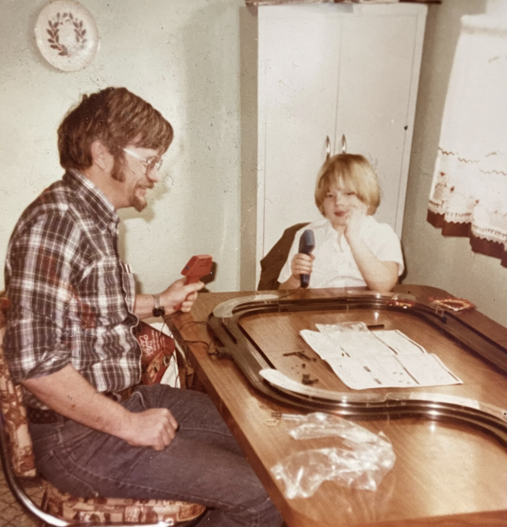 Me with my dad and my new race track in our dining room circa 1977.