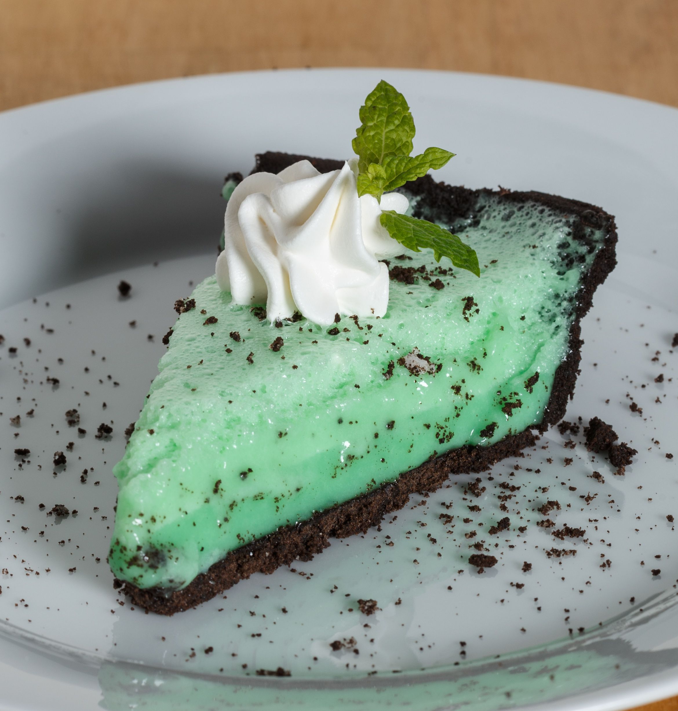 a slice of grasshopper pie on a plate
