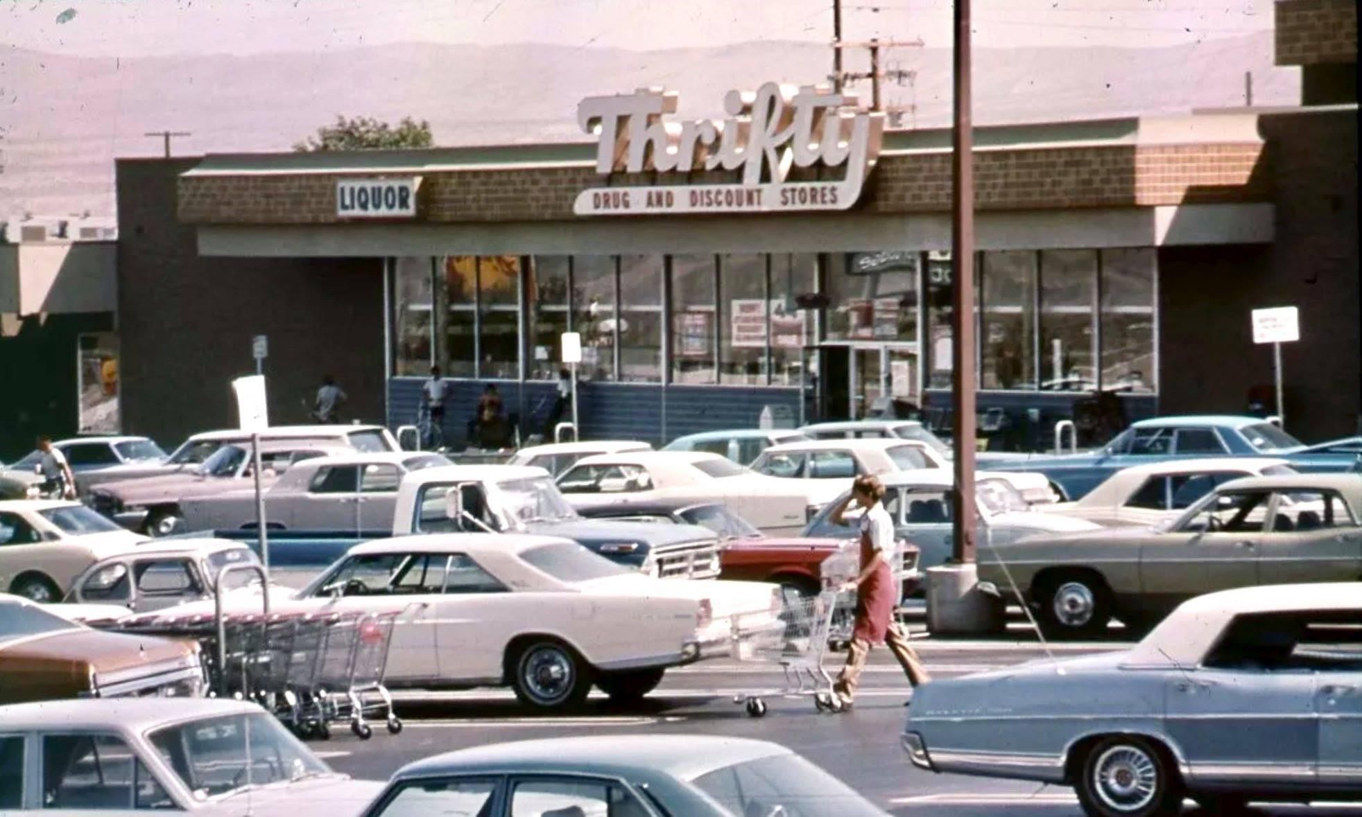 A Thrifty store parking lot in Barstow, California, 1970s.