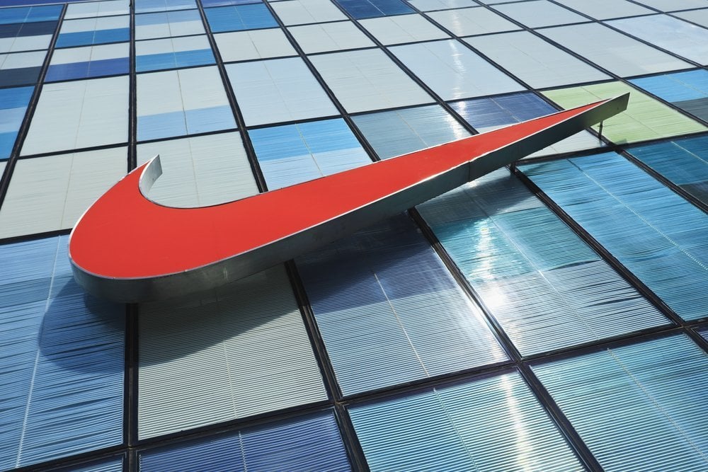 Nike store logo shot from below on the facade of the Nike store Beijing
