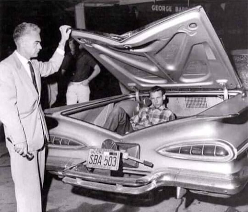 Busted for sneaking into the drive-in movie. Circa late 50s early 60s.