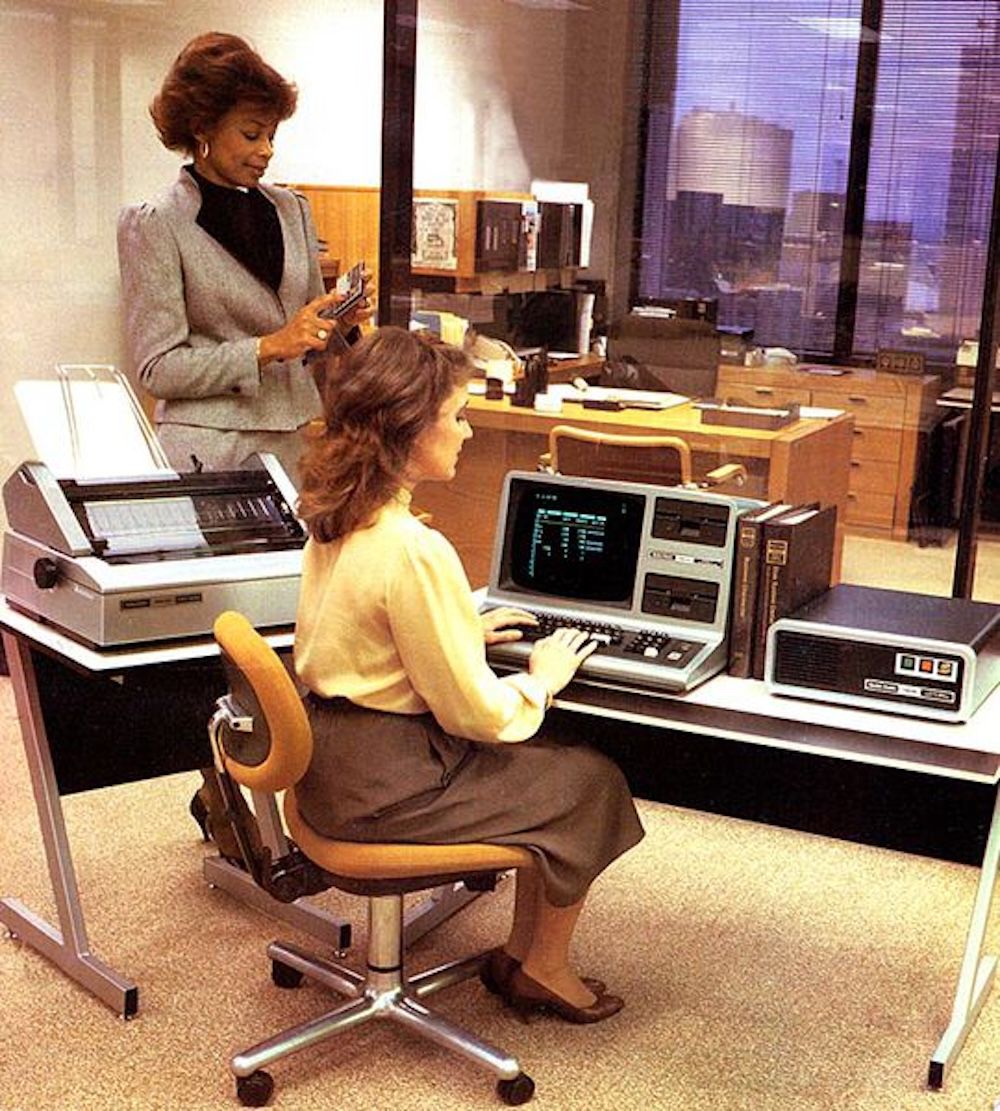 women working in an office in the 1980s