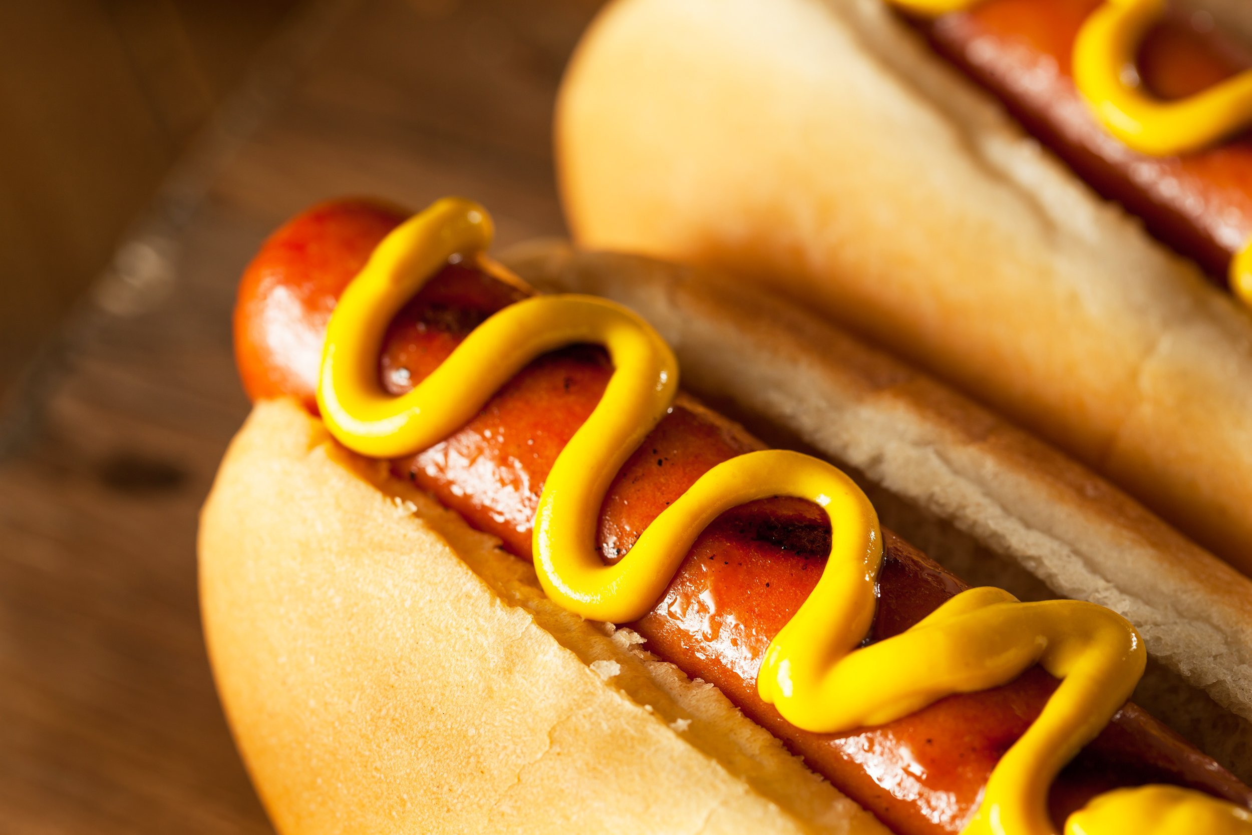 grilled hot dog with yellow mustard
