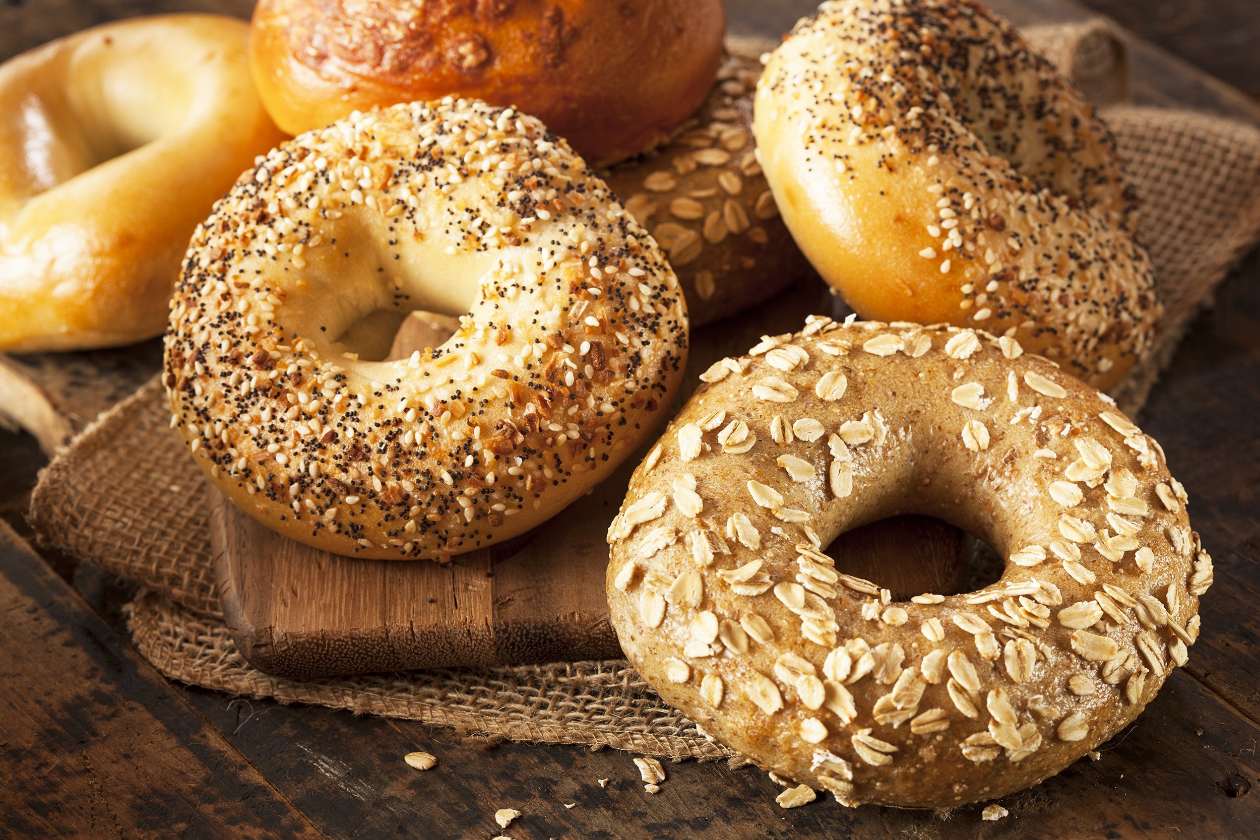 whole grain bagels on rustic background