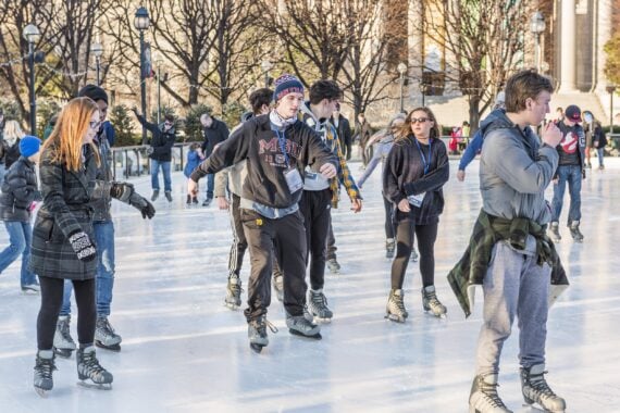 many people in ice rink in National Gallery of Art Sculpture garden