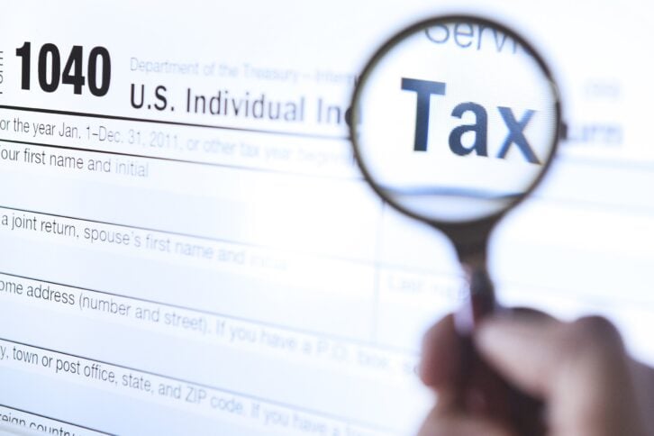 magnifying glass on tax form 1040