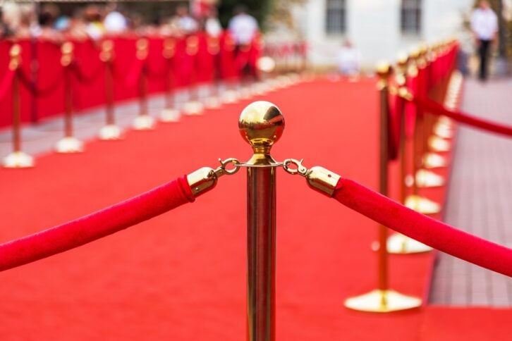 red carpet with barrier rope