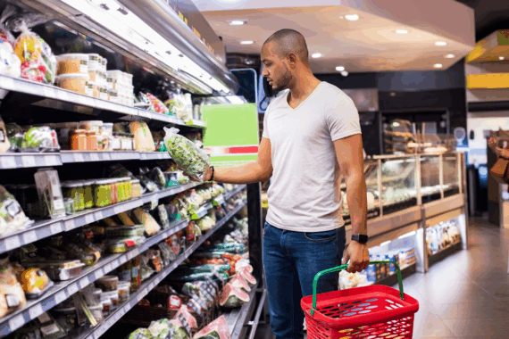 Man grocery shopping