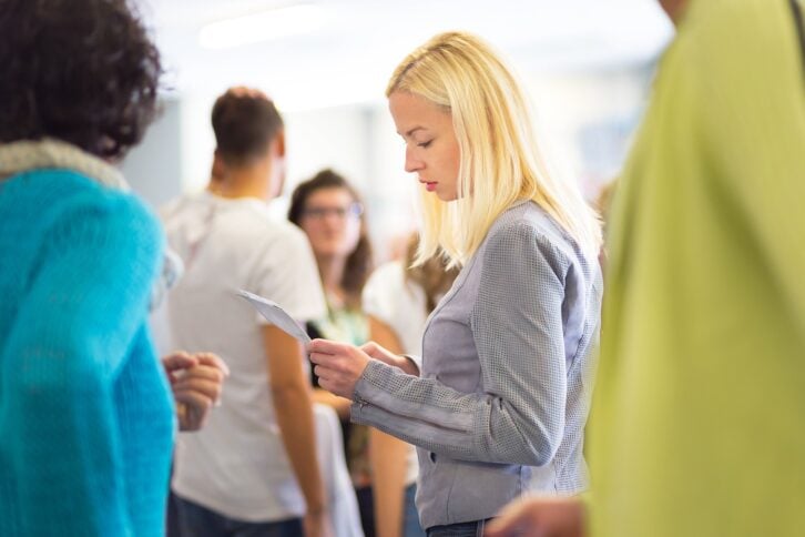 Woman Waiting In Queue