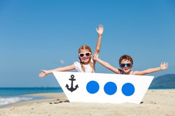 happy children playing on the beach