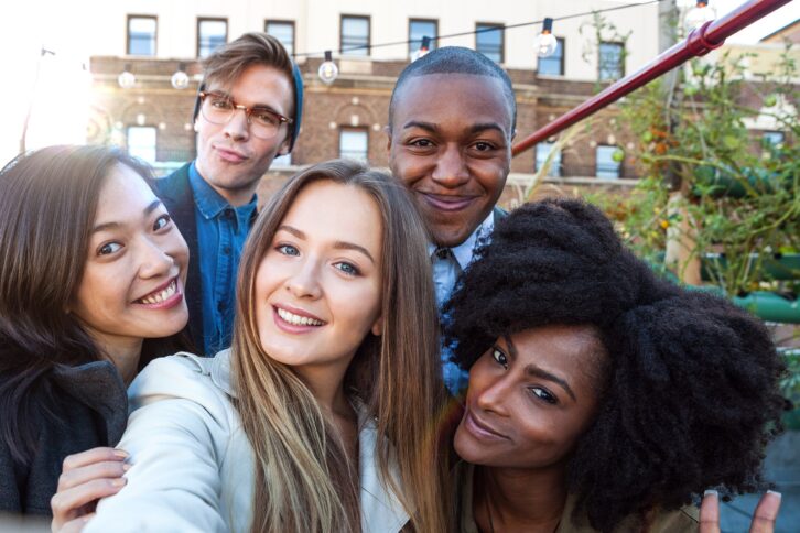 friends have fun in a New York rooftop party