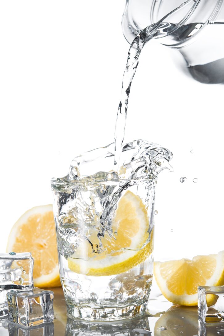pouring water into glass