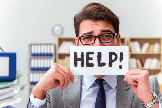 Busy businessman asking for help with work
