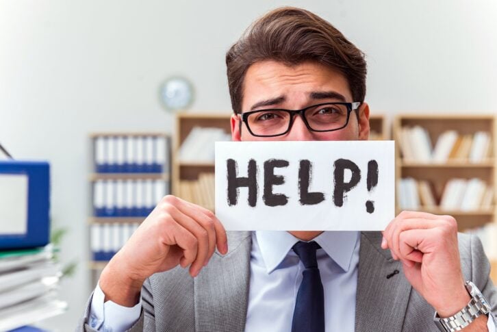 Busy businessman asking for help with work