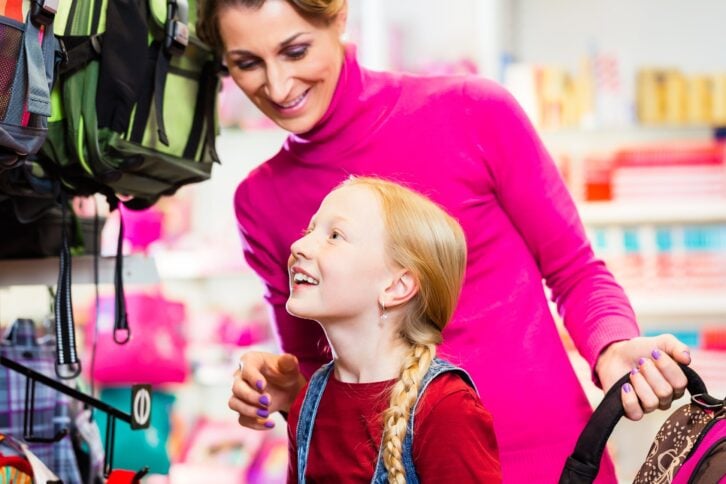 mother and daughter shopping for school supplies