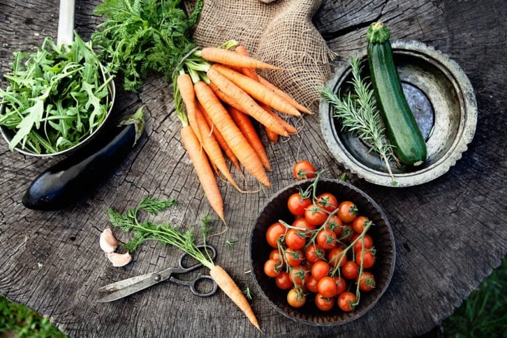 vegetables on wood stump from garden
