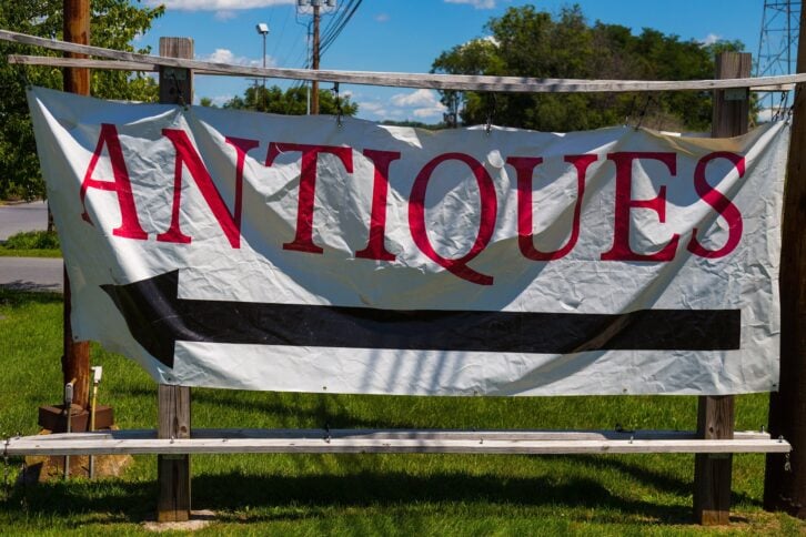 antiques banner sign along road