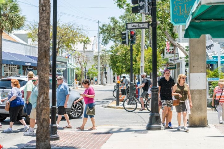 people crossing crossing Duval and Angela street, Florida