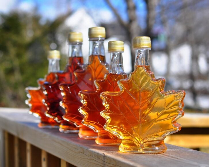 different color variations of maple syrup on porch outside