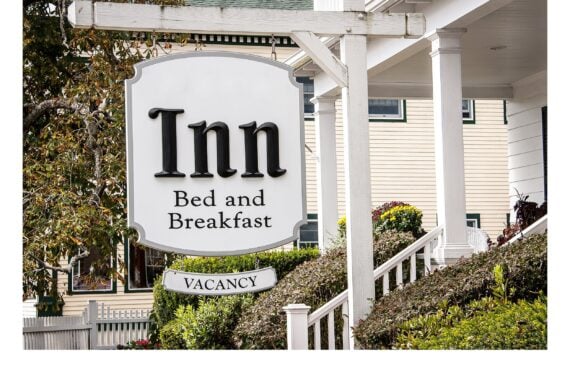 Sign outside of an old fashioned bed and breakfast inn