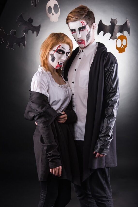 young couple celebrating Halloween in costume