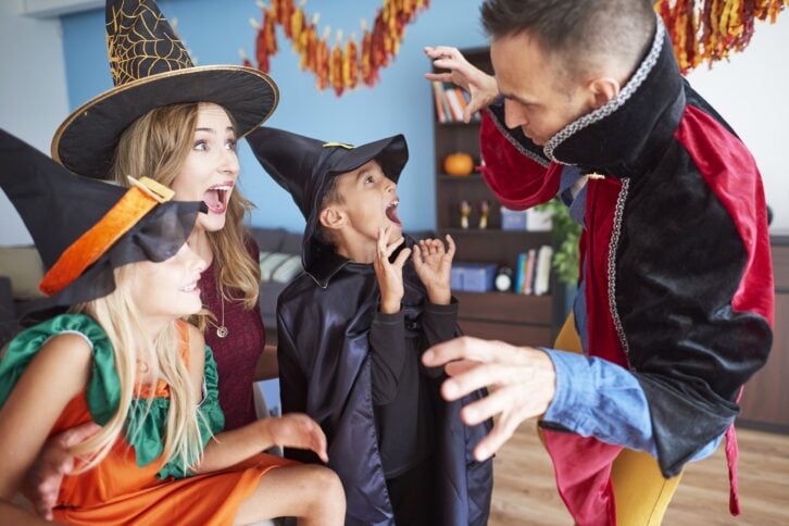 family in costumes for Halloween