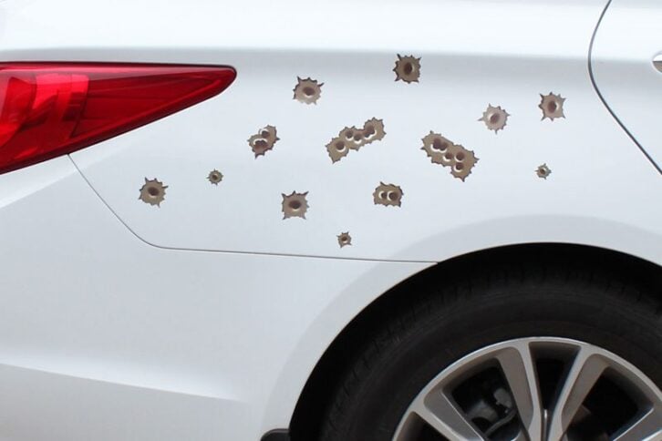 car with Bullet Hole Stickers
