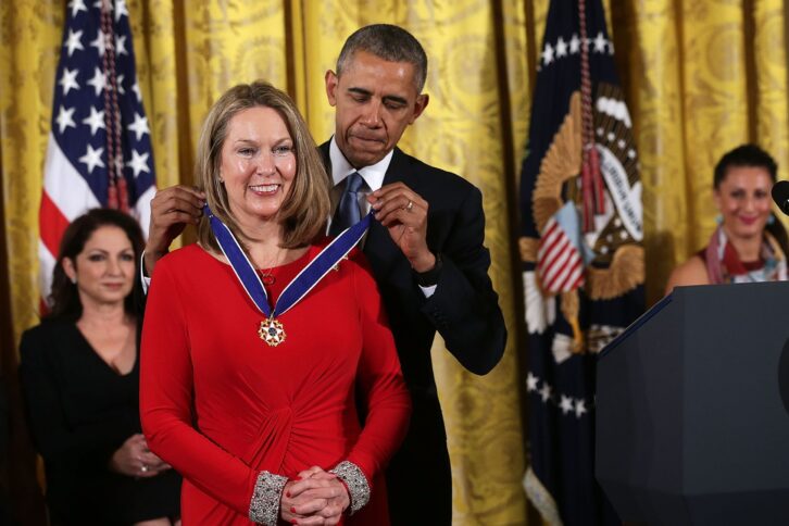 U.S. President Barack Obama presents the Presidential Medal of Freedom to Bonnie Carroll during an East Room ceremony November 24, 2015 at the White House in Washington, DC.