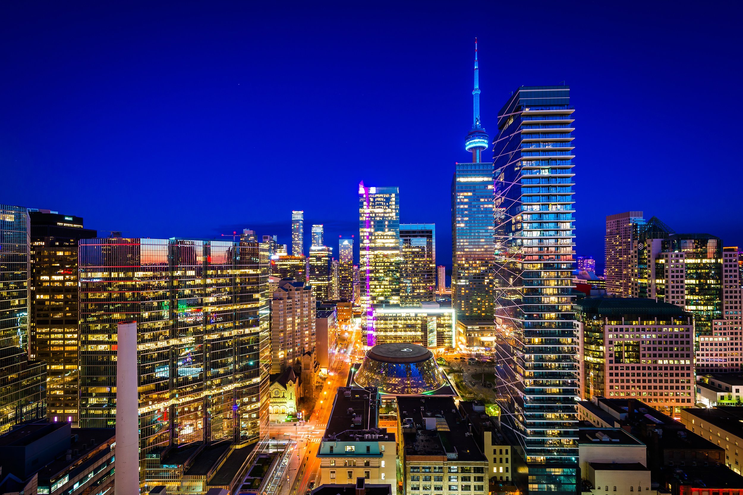 view of modern buildings at twilight in downtown Toronto, Ontario