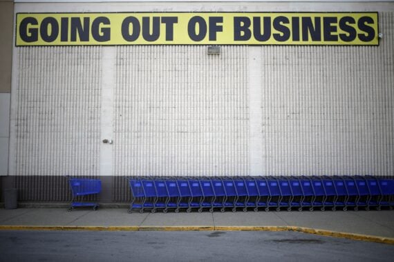 A "Going Out Of Business"sign is displayed outside a retail store in Kentucky.