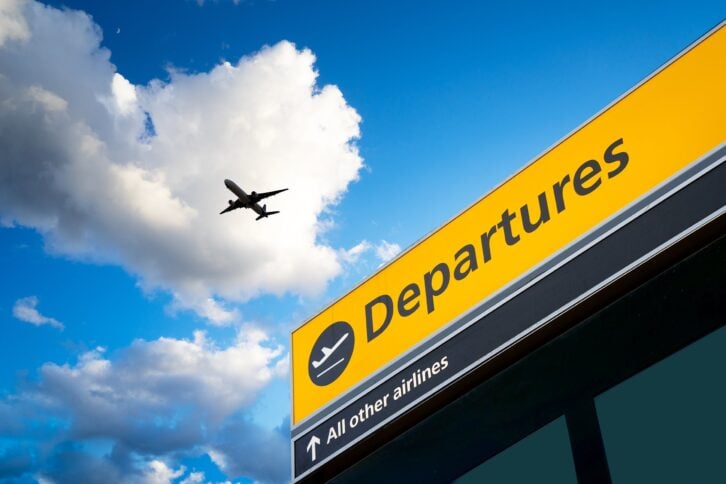 airline and airport departure sign