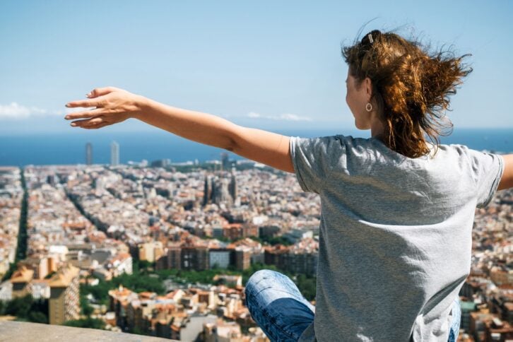 tourist enjoy of the view from above of Barcelona
