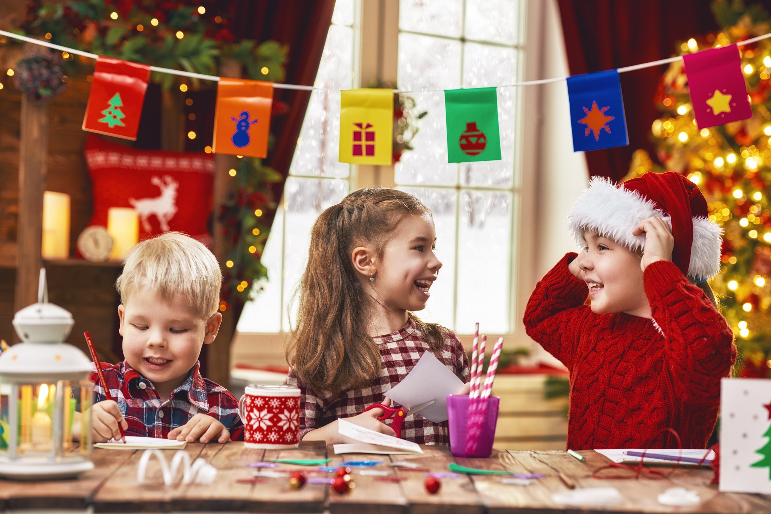 little children make cards, gifts, and decorations for the holiday