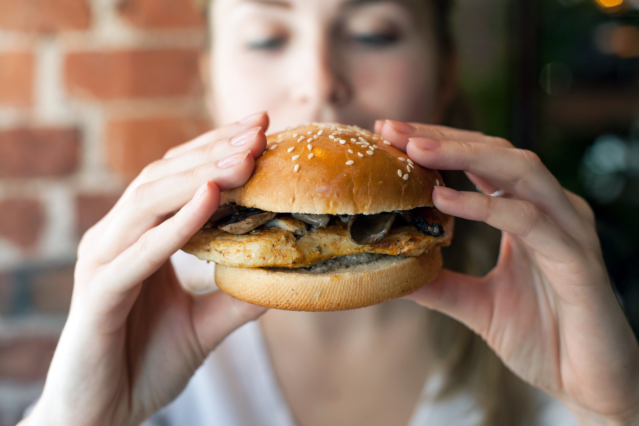 Woman eating a burger