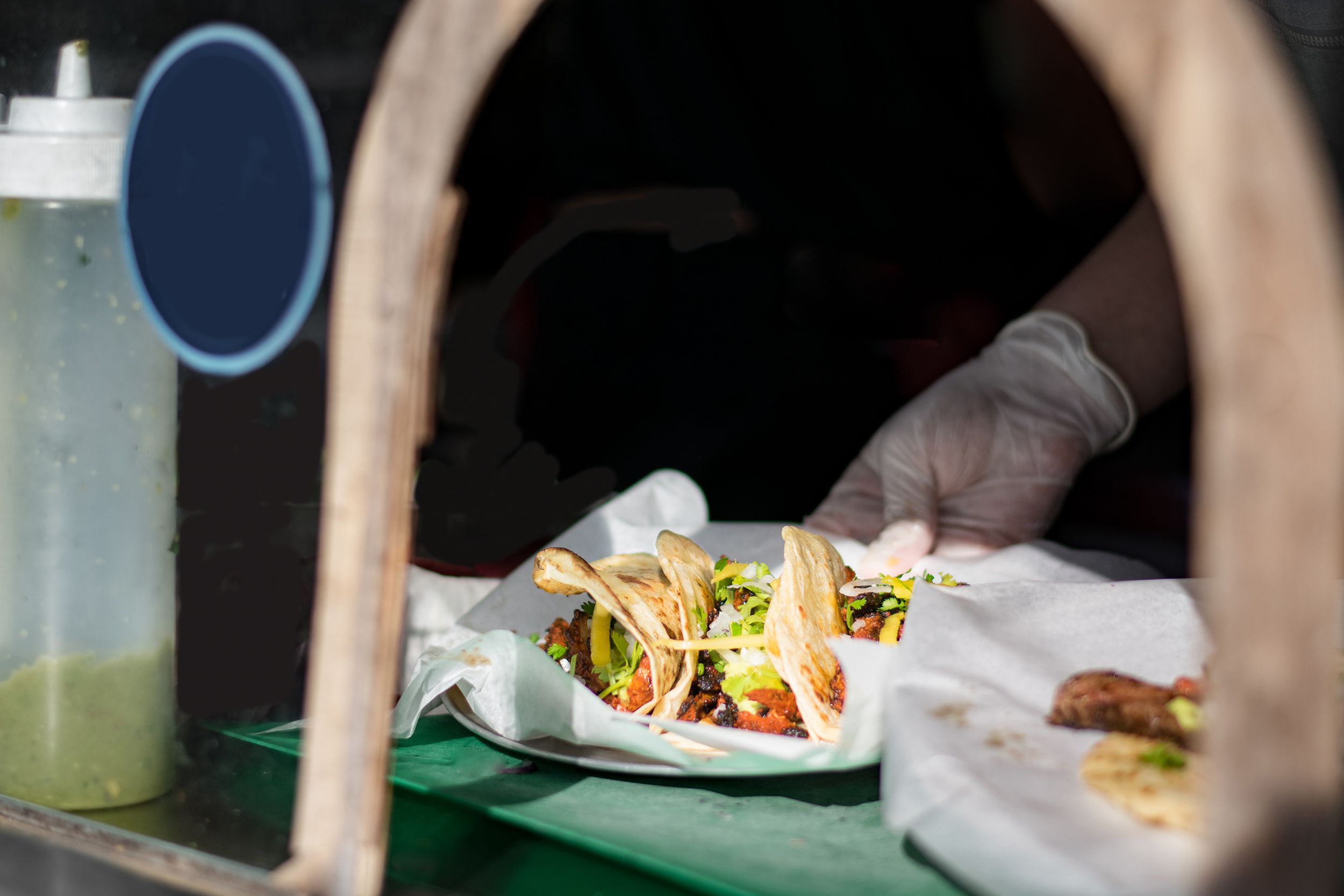 tacos being served at a taco truck