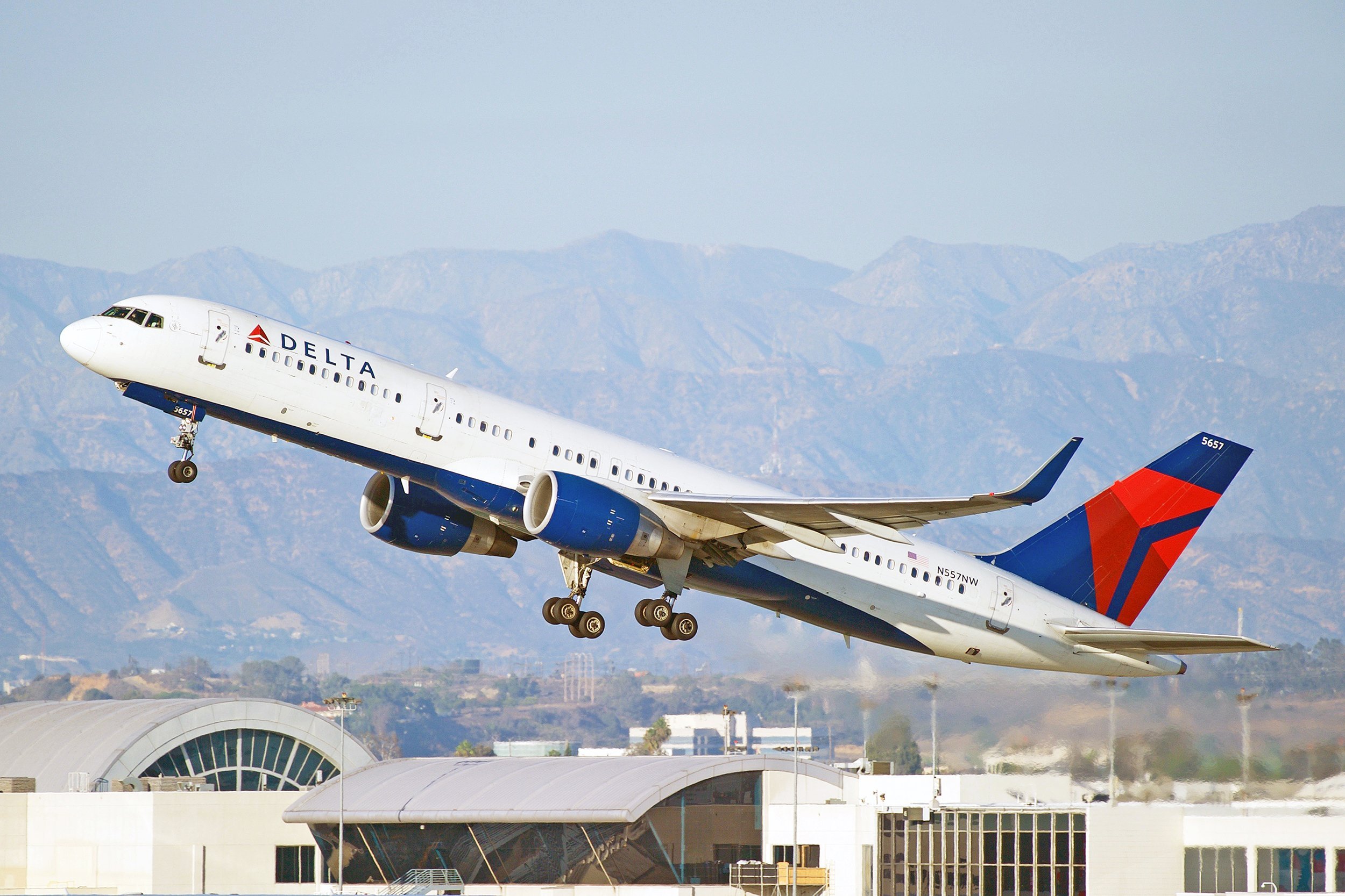 Delta Air Lines Boeing aircraft is airborne as it departs Los Angeles International Airport
