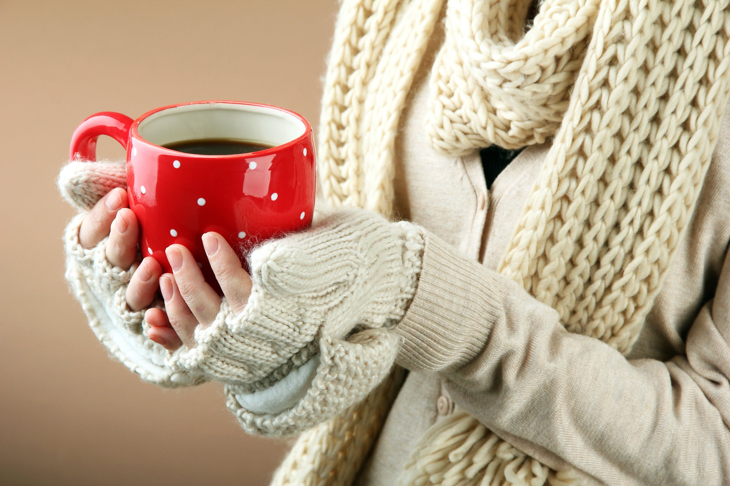 female hands with hot drink