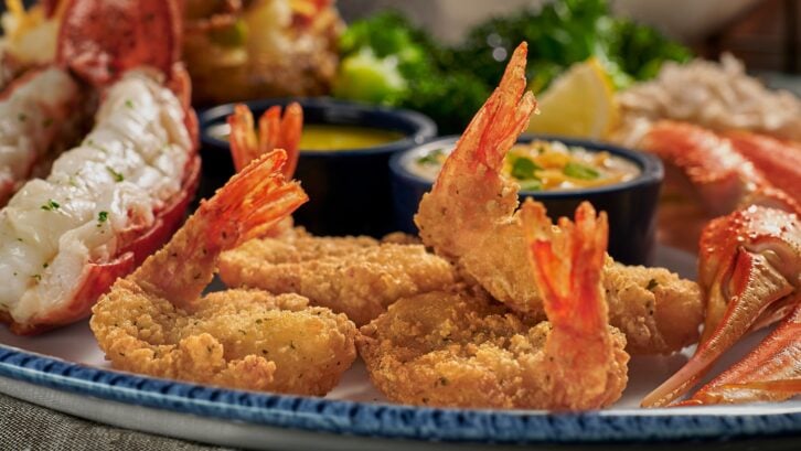 A closeup of cheddar bay breaded shrimp on a plate from Red Lobster.