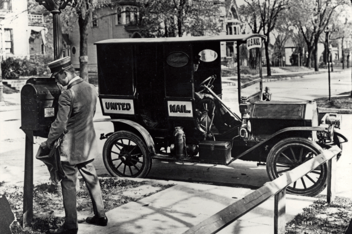 Letter Carrier Collecting Mail