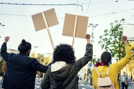 Protesters with signs