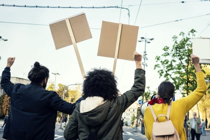 Protesters with signs